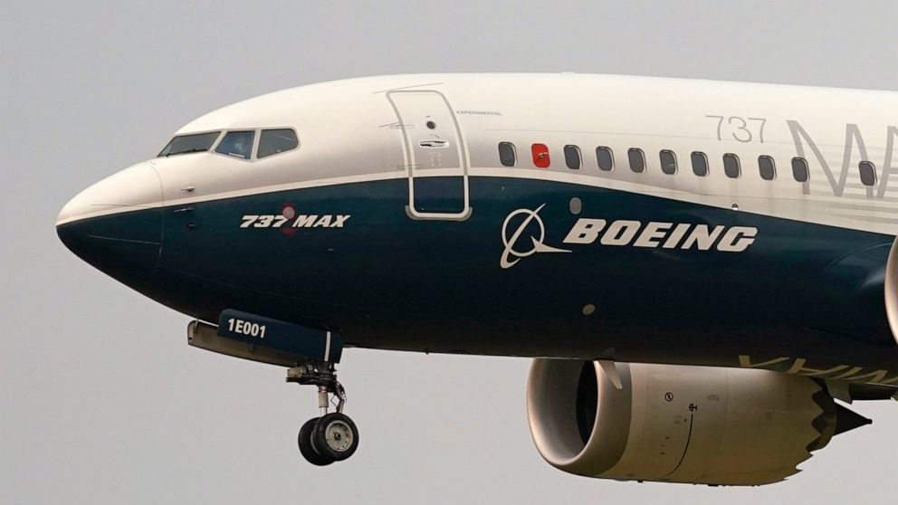 FILE - A Boeing 737 Max jet prepares to land at Boeing Field following a test flight in Seattle, Sept. 30, 2020. Boeing officials said Thursday, Sept. 15, 2022, that they will find new buyers for Boeing 737 Max jets that were built for Chinese airlin